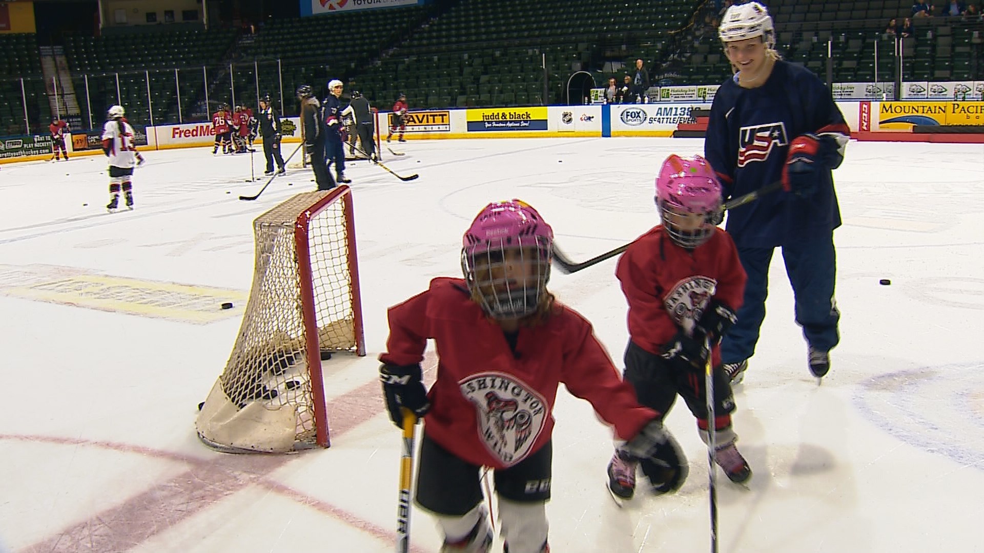Hockey Twins skate with Team USA Twins in Everett